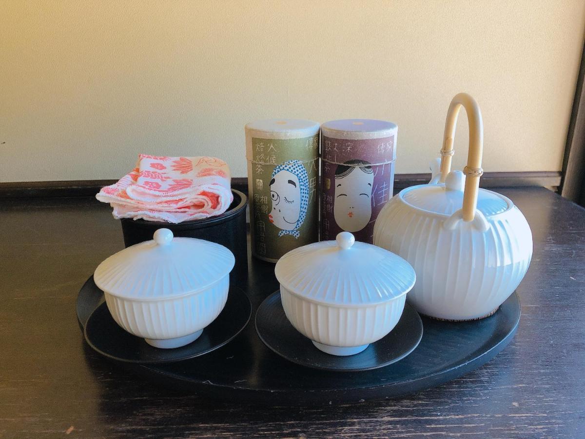 Arima Onsen Tocen Goshobo Kobe Exterior foto A set of Japanese tableware